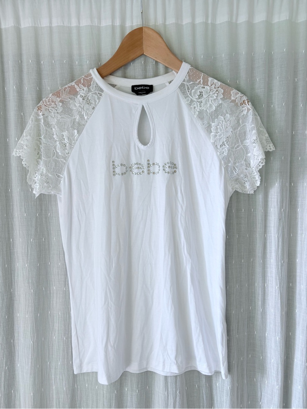 bebe White Lace Sleeve Keyhole Tee with Rhinestone Logo